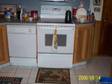 white maytag undercounter dishwasher and Gibson electric stove